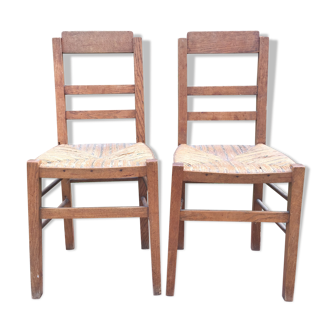 2 chaises vintage en chêne assises paillées d’époque reconstruction