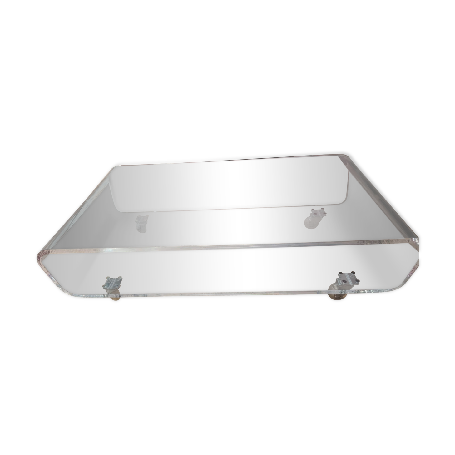 Design coffee table from Habitat in transparent plexiglass, mounted on wheels.