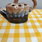 Alpho earthenware spikes in the shape of a watering can