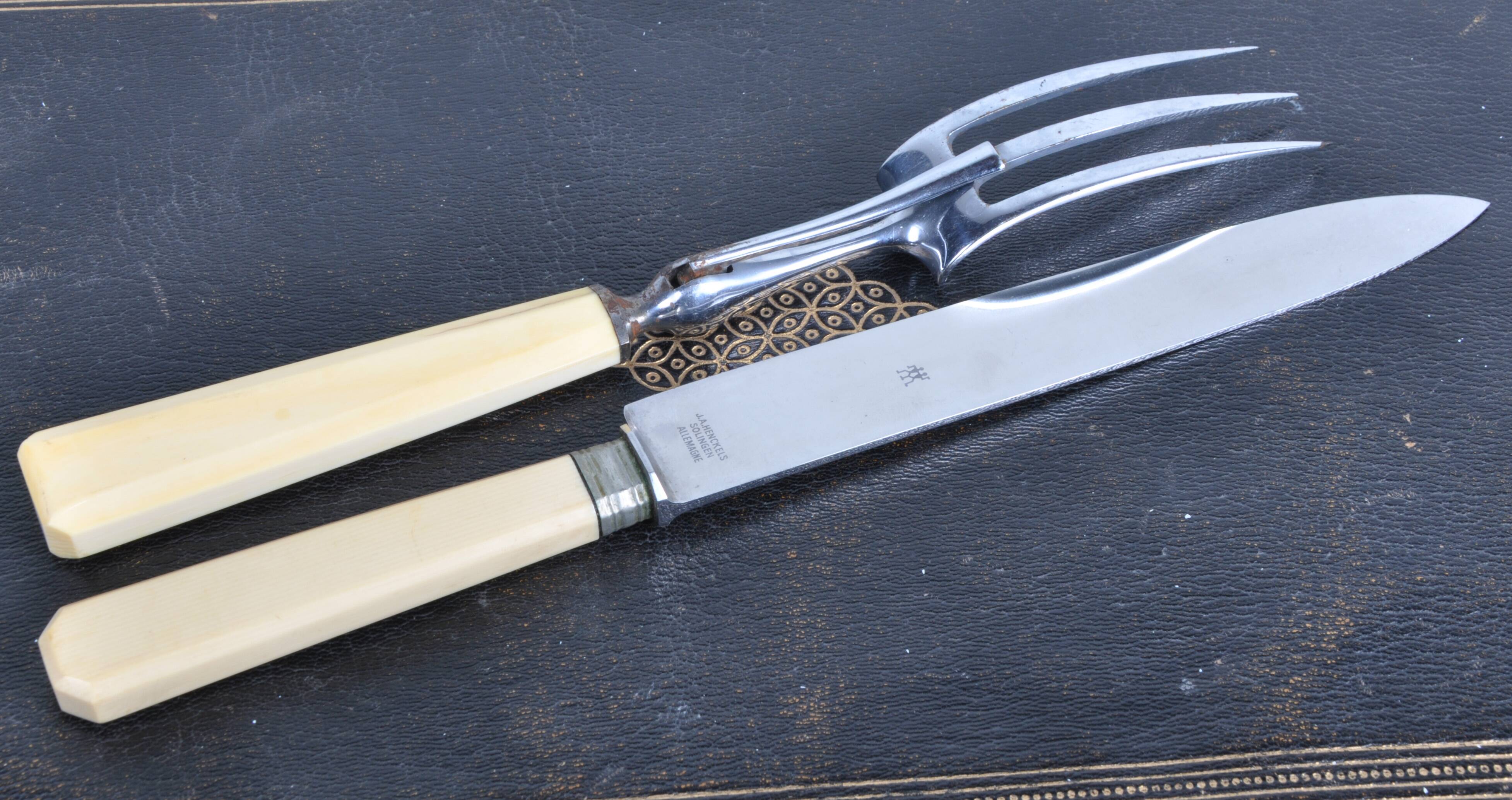 Antique knives with ivory handles.
