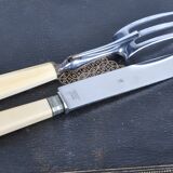 Antique knives with ivory handles.