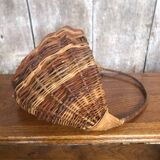Old grape picker's basket wicker woven vines vintage wine