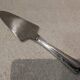 Silver-plated metal pie server with cutting handle, by the silversmith Ercuis Valencay