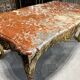 Table de milieu en bois doré d’époque napoléon iii dessus de marbre rouge