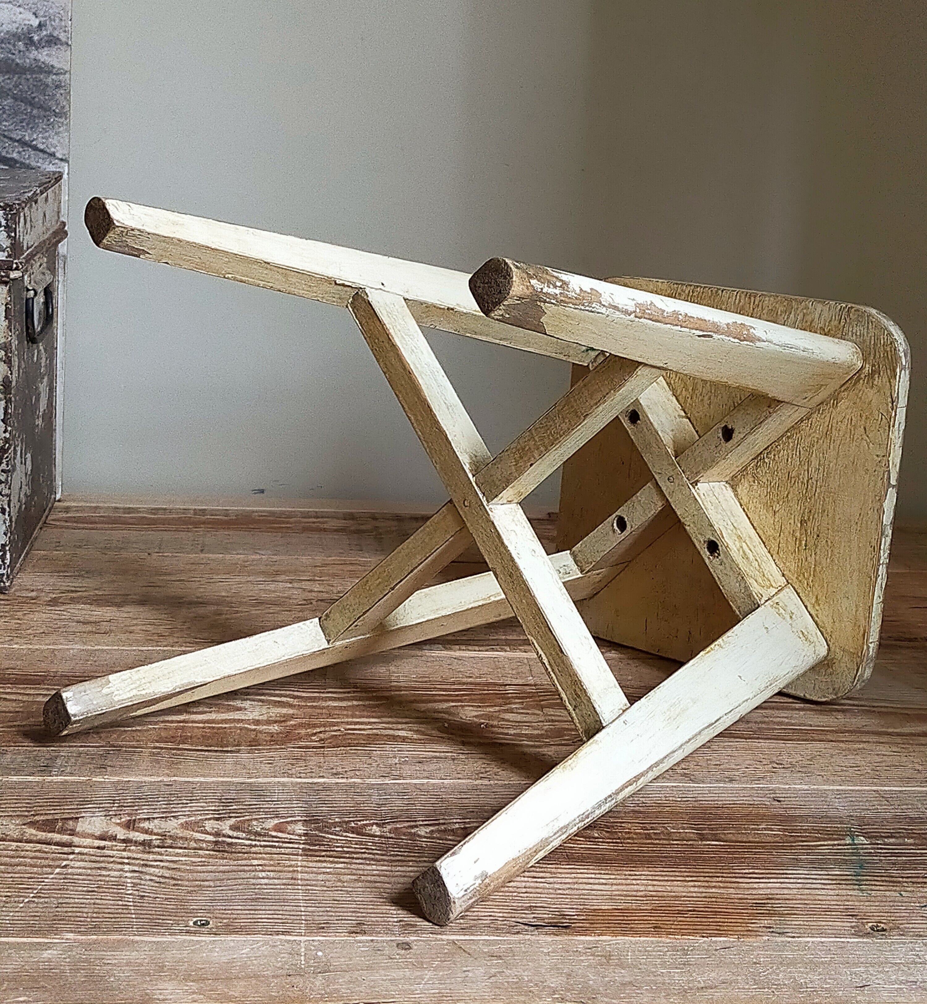 Old workshop stool in patinated solid wood