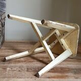 Old workshop stool in patinated solid wood
