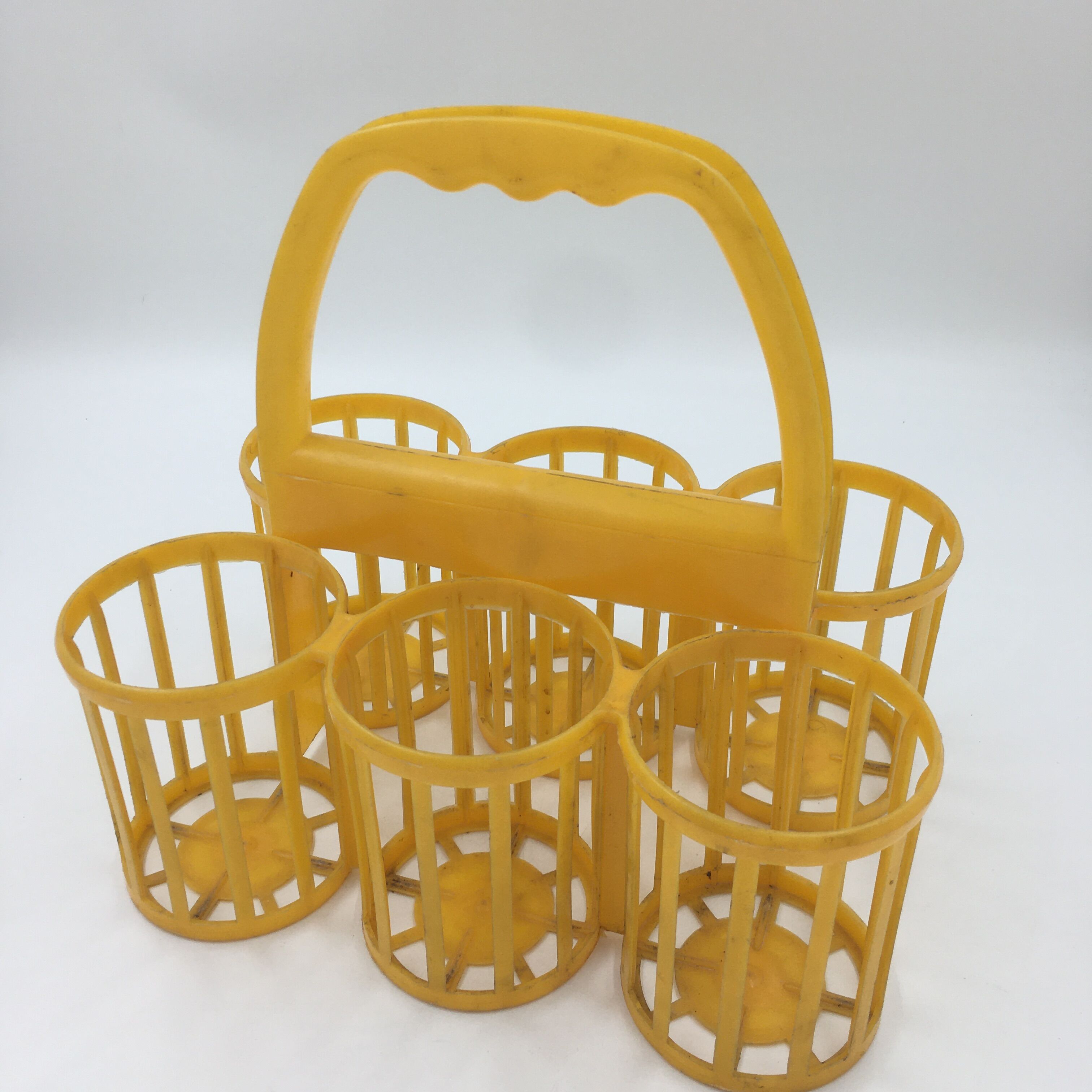 Vintage yellow bottle holder