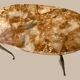 Table basse ovale en onyx et laiton 1950