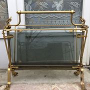 Revised door in brass and smoked glass