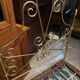 One person romantic bed with bedside table brass bedroom chair