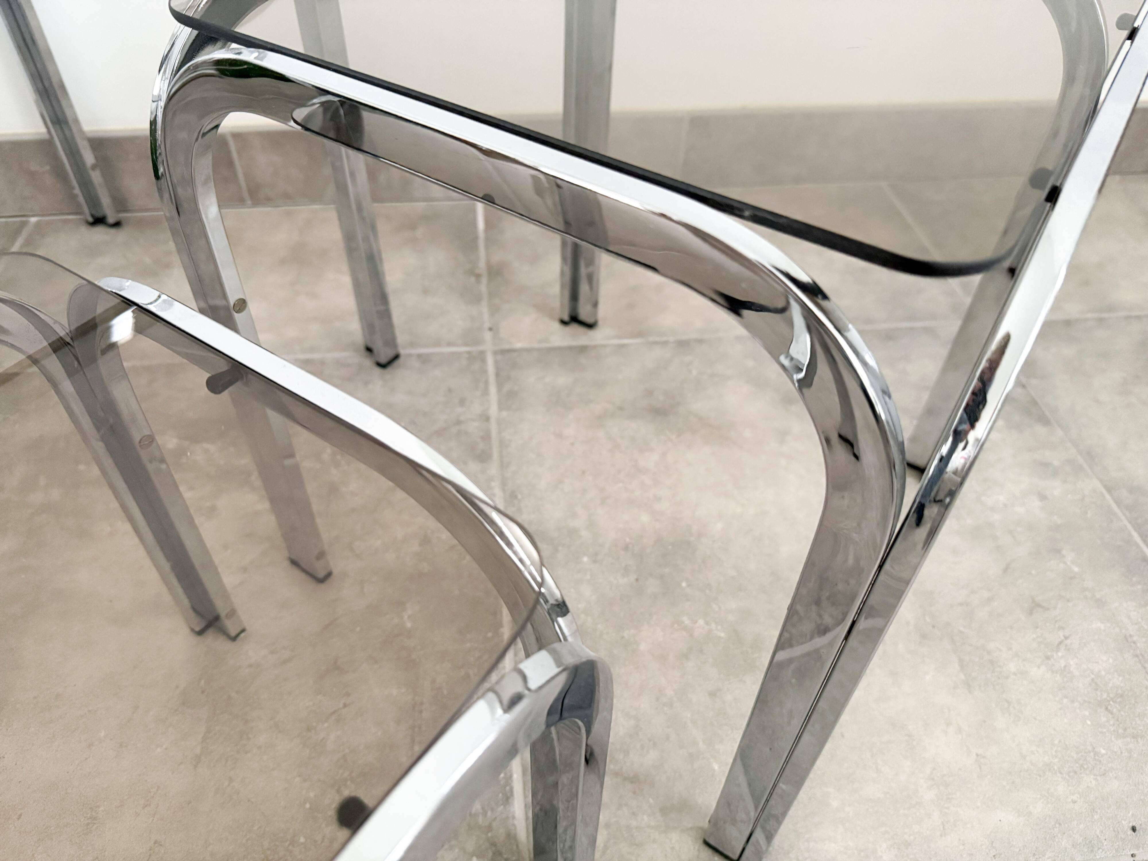 Set of 3 nesting tables, chrome and smoked glass, 1970s.