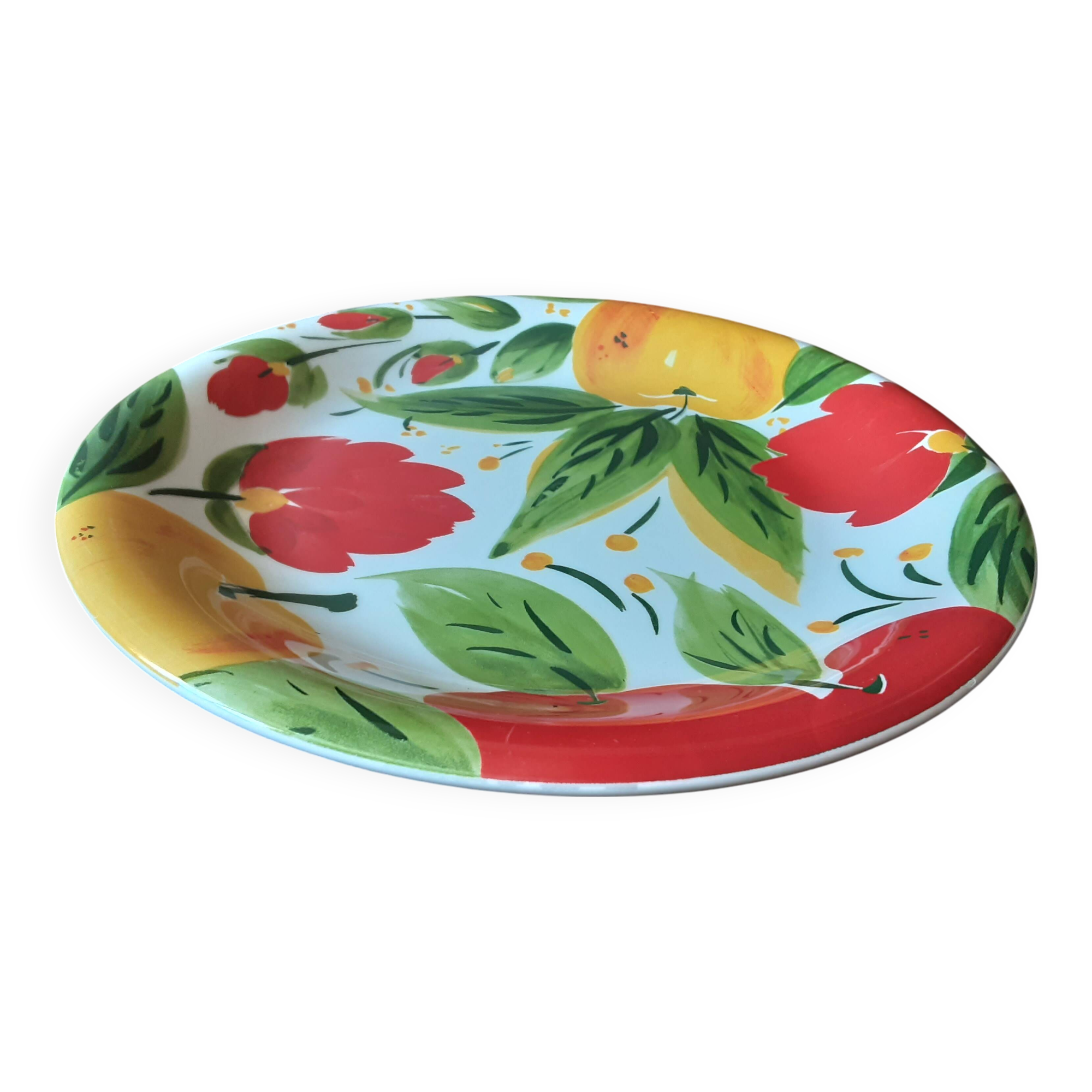 Quadrifoglio dish. Italian. Fruit and flower decoration. Shimmering colors.
