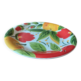 Quadrifoglio dish. Italian. Fruit and flower decoration. Shimmering colors.