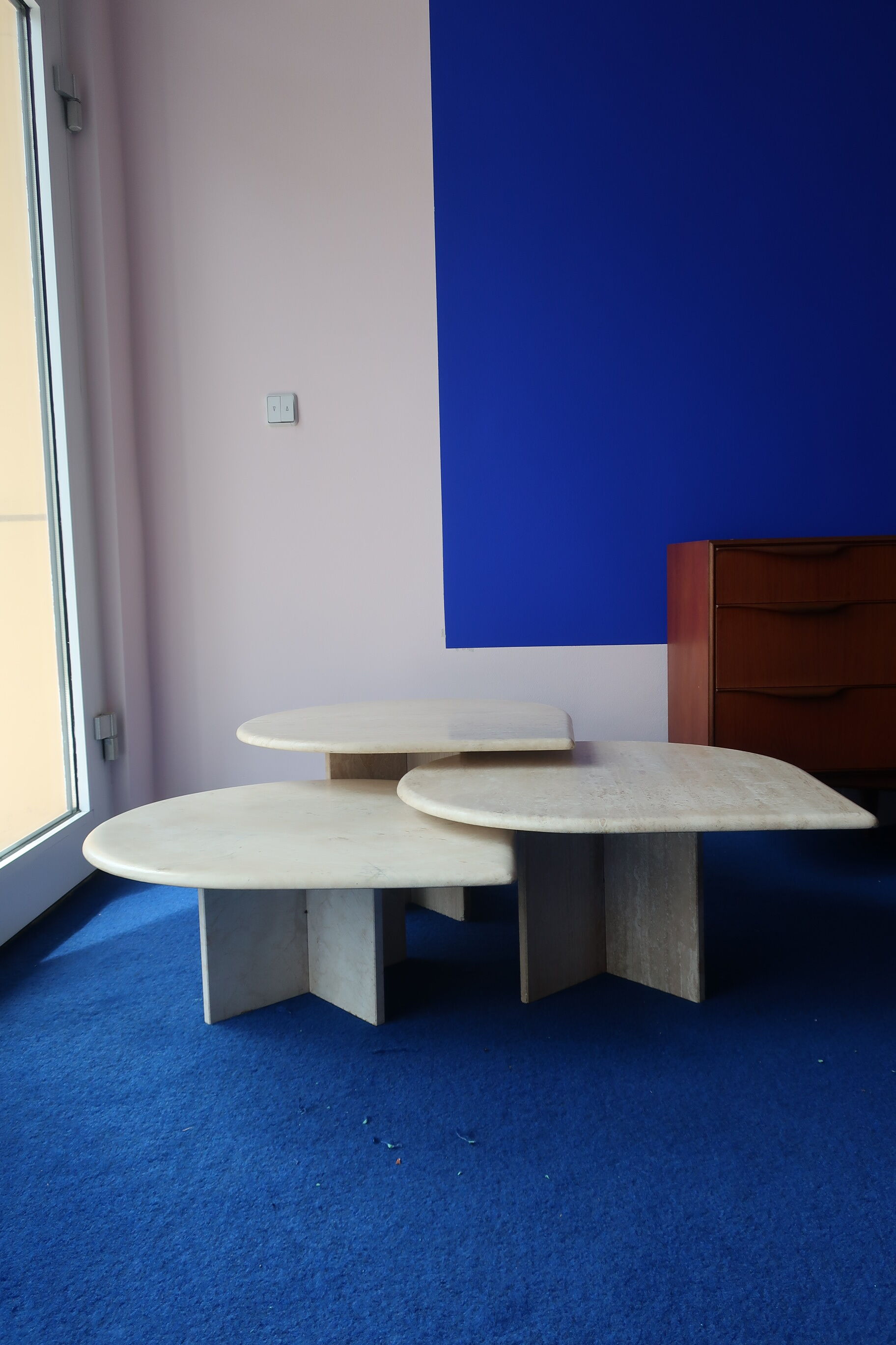 Vintage tables of the 80s in travertine