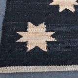 Handwoven wool and jute rug