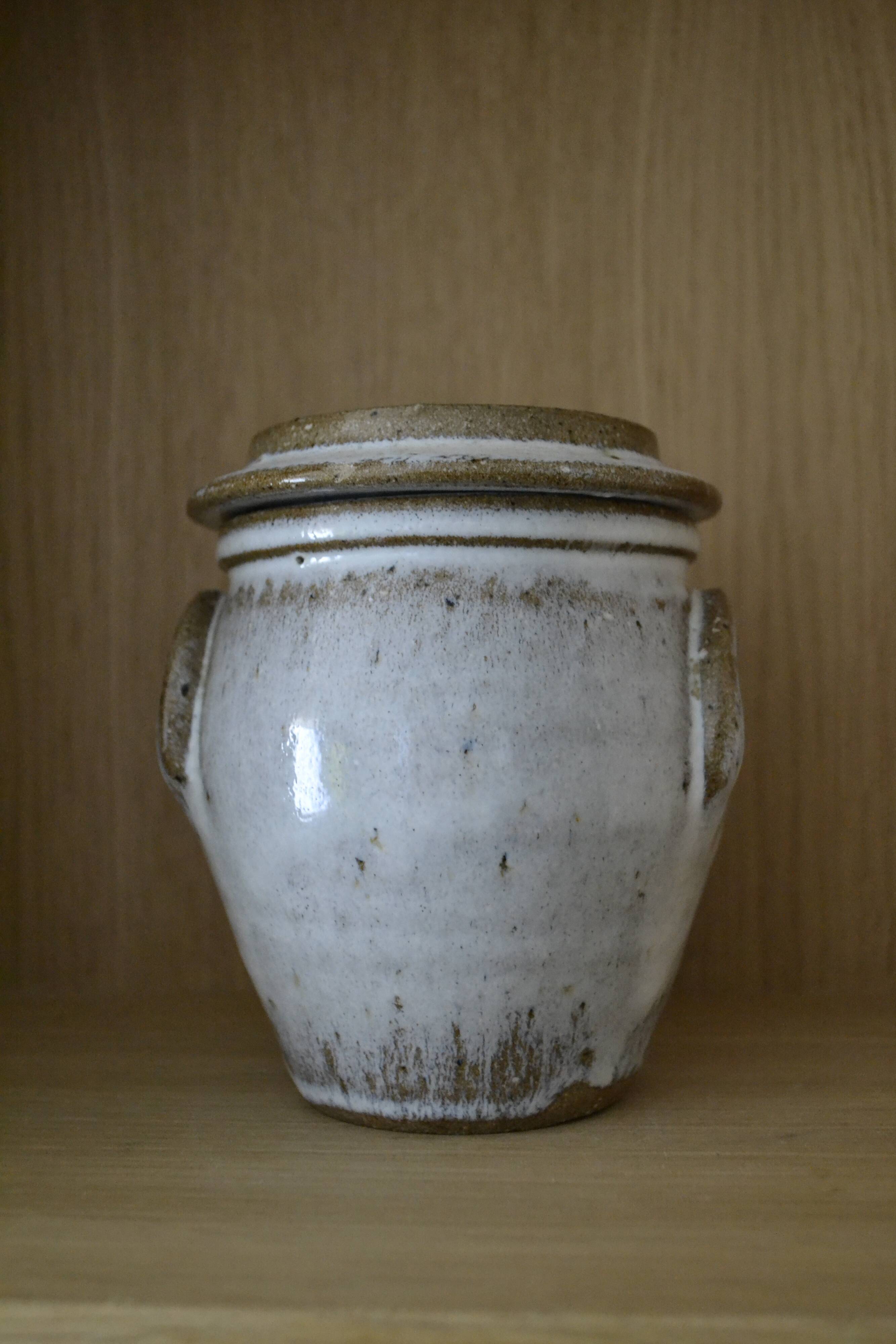 Artisanal beige sandstone pot