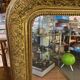 LARGE LOUIS XV STYLE ROCAILLE MIRROR IN GILT STUCCO FORAL DECOR ON PEDAL