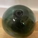 Floating fishing ball in glass