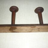 Wooden wall-mounted coat rack