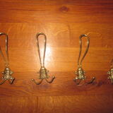 Set of 4 hooks in gilded metal