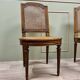 Suite Of Four Cane Chairs In Louis XVI Style Natural Wood