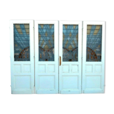 Suite de quatre portes de séparation en vitrail Art Déco XX siècle