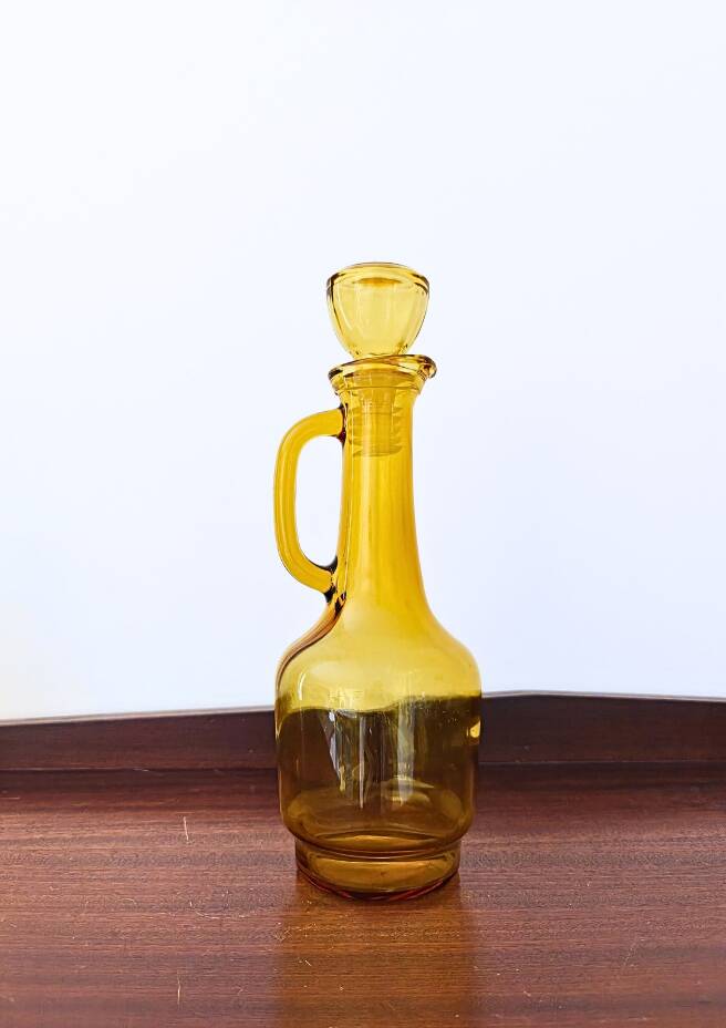 Set of two vintage amber glass carafes attributed to Lubiana.