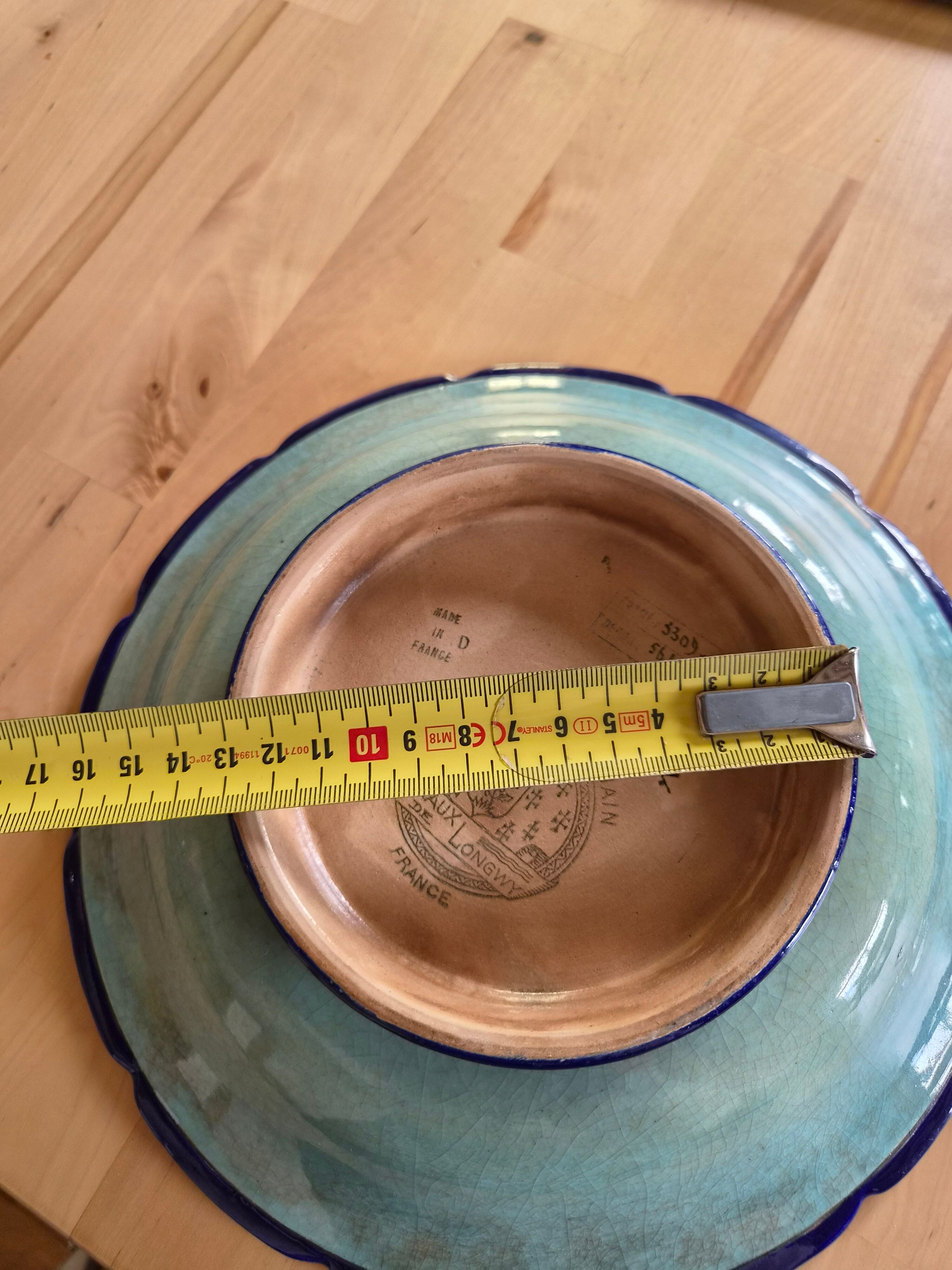Plate in Émaux de Longwy with no cracks or chips.