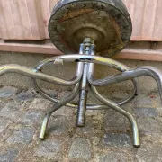 Vintage low swivel stool in chrome steel from the 1970s.