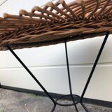 Rattan coffee table with black metal base
