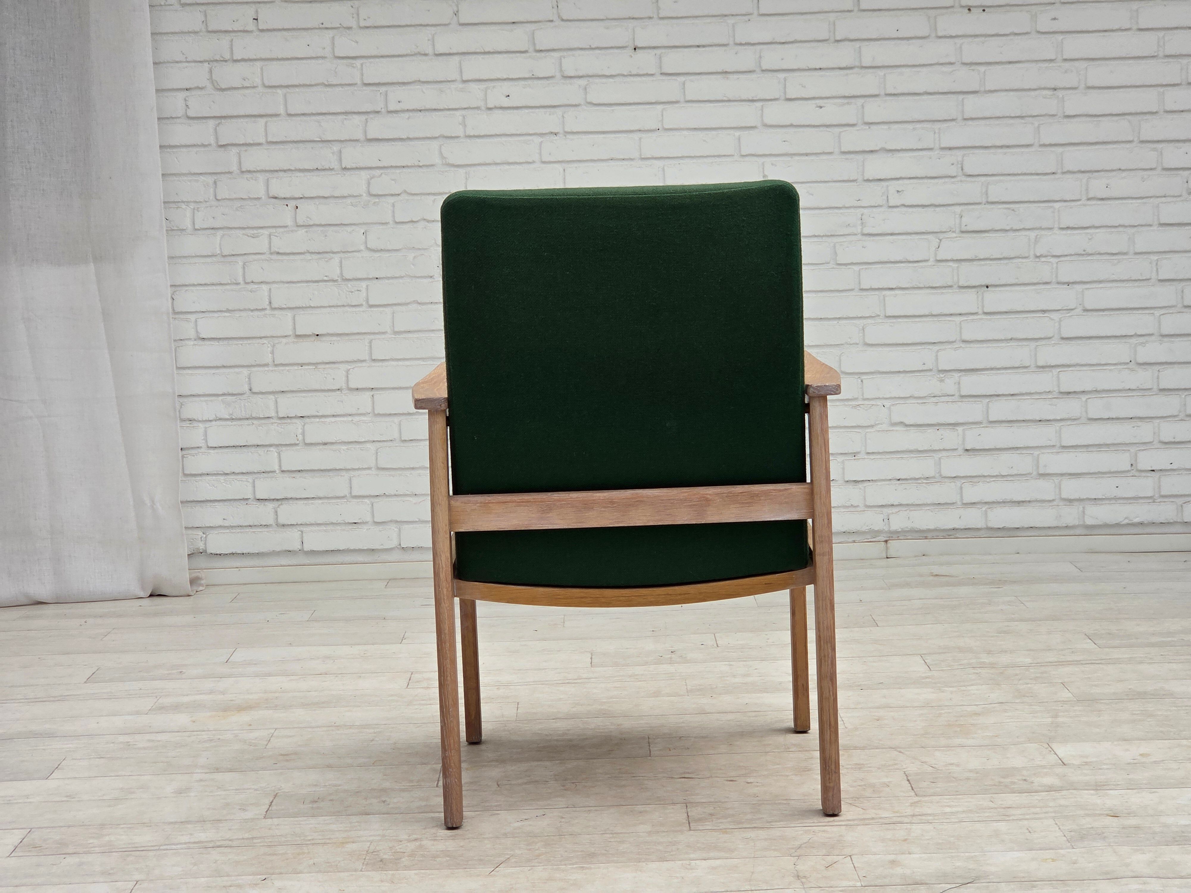 1980s, Danish armchair by Høng Stole, green furniture wool, oak wood.