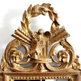 Miroir en bois doré, style Louis XVI – 1ère partie XXe - 60x30cm