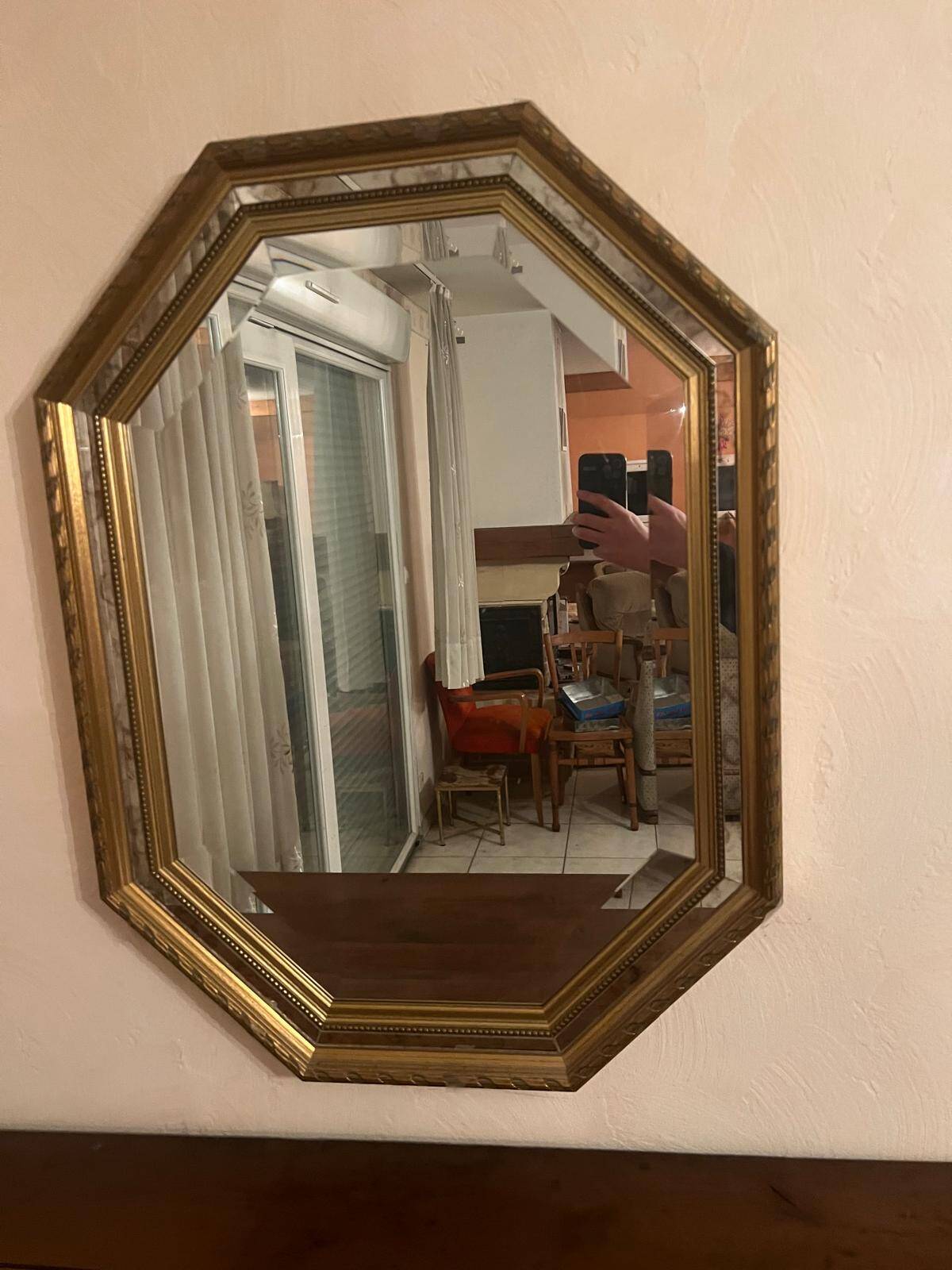 Octagonal mirror with gilded wooden beaded borders