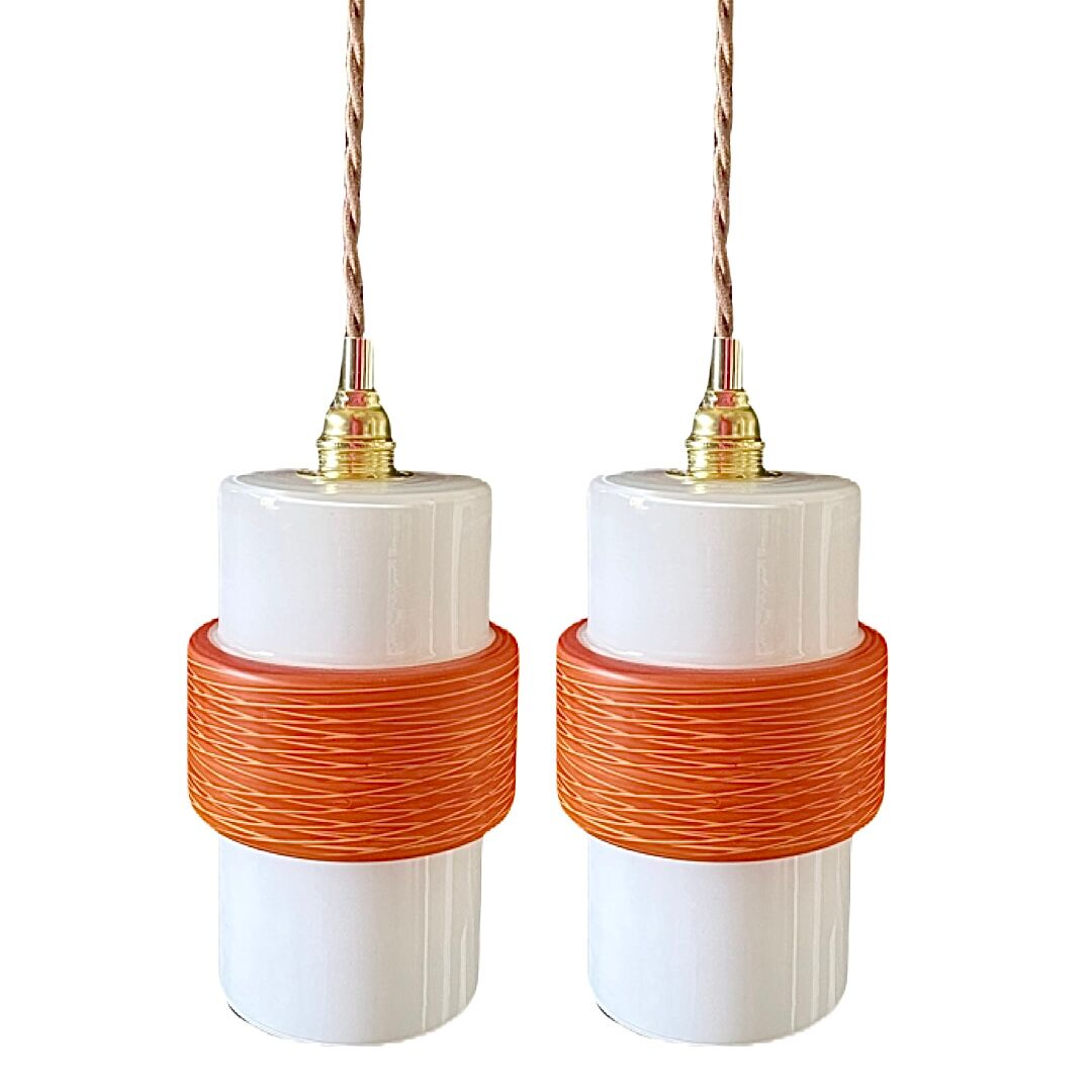 Pair of vintage suspensions electrified to nine