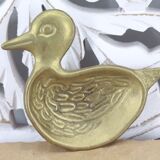 Empty brass duck pocket