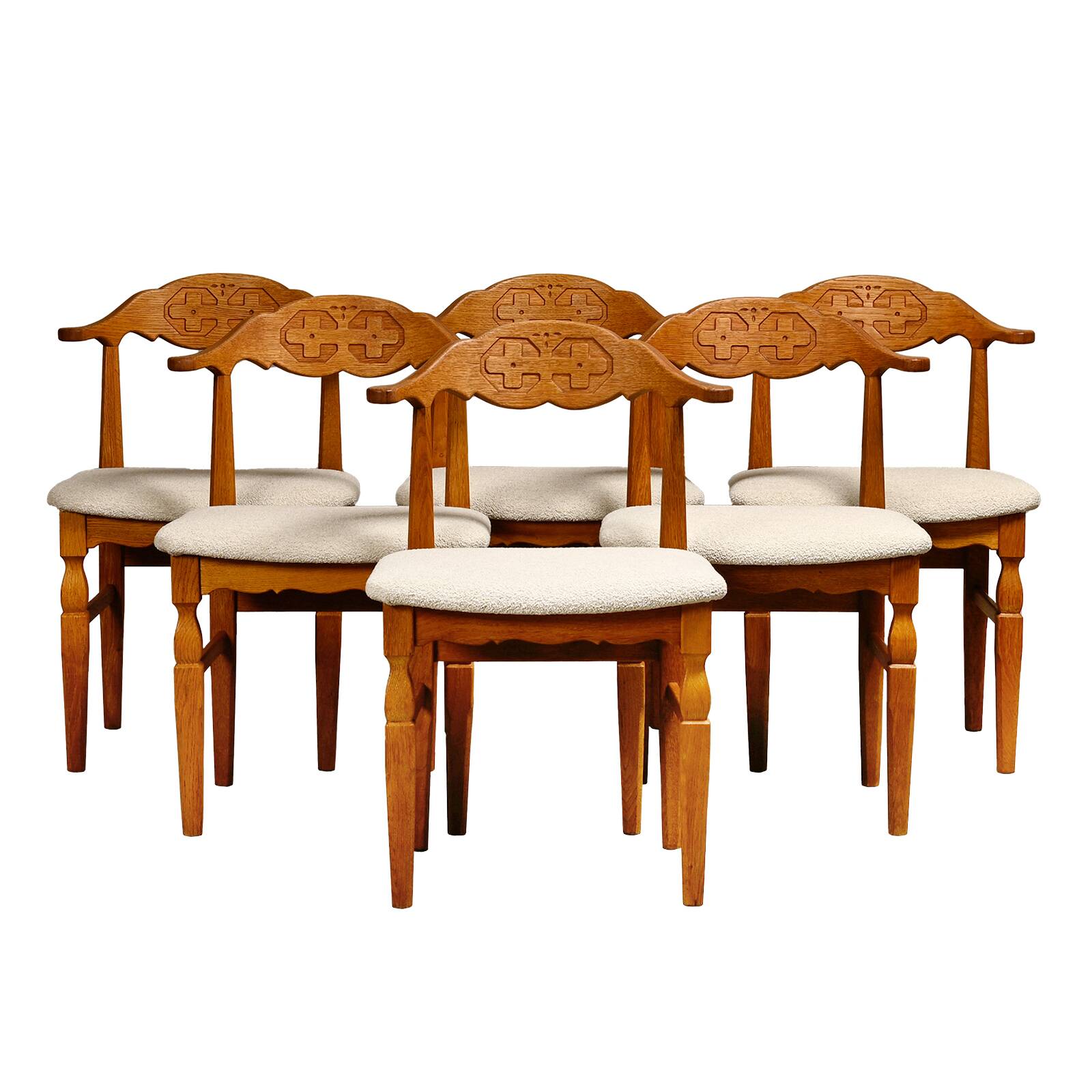 Henning Kjærnulf dining chairs set in Oak and Off White Bouclé, Denmark, 1960s