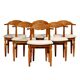 Henning Kjærnulf dining chairs set in Oak and Off White Bouclé, Denmark, 1960s