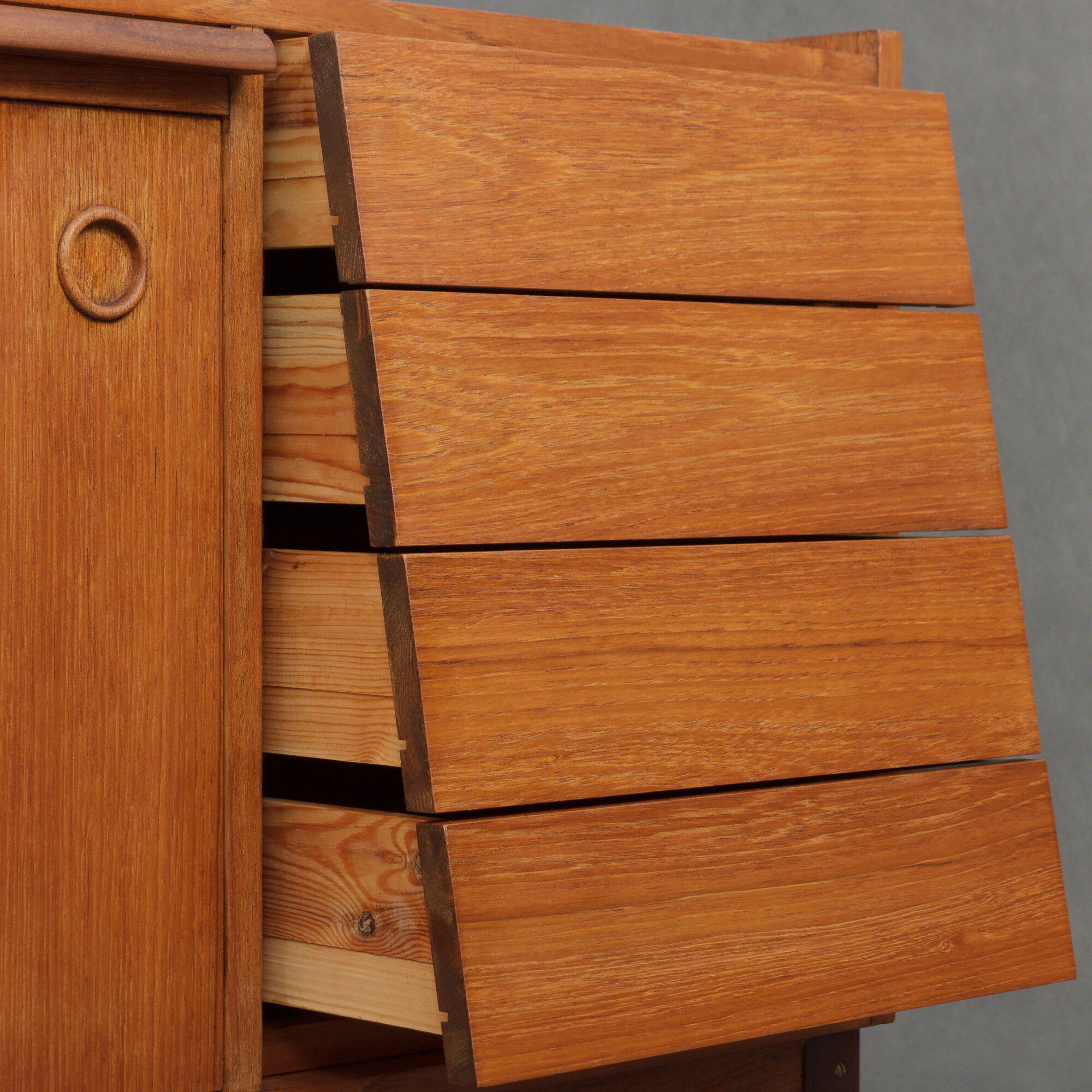 Small Danish teak sideboard with a pull out tray