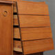 Small Danish teak sideboard with a pull out tray