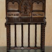 18th-century carved Spanish cabinet with hidden storage.