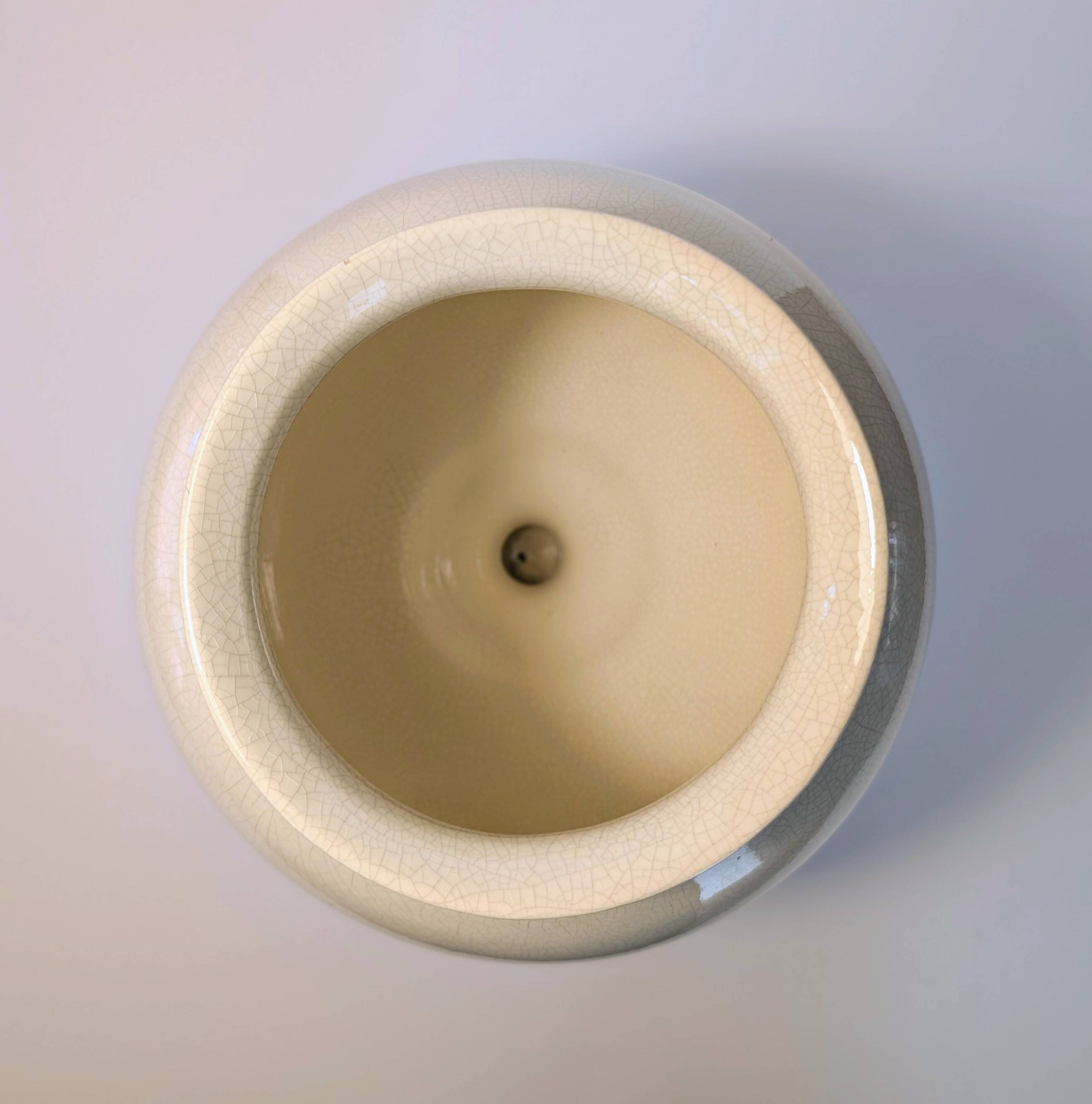 Cracked cream ceramic leech cup