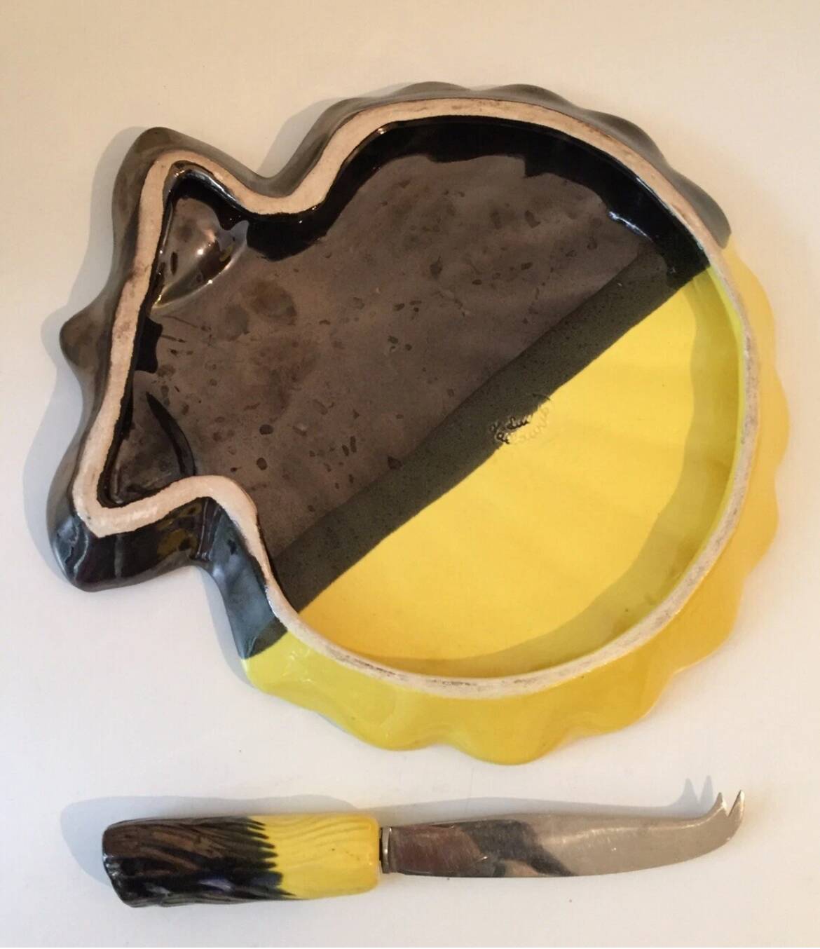 Vintage yellow and black cheese board by Luc Vallauris
