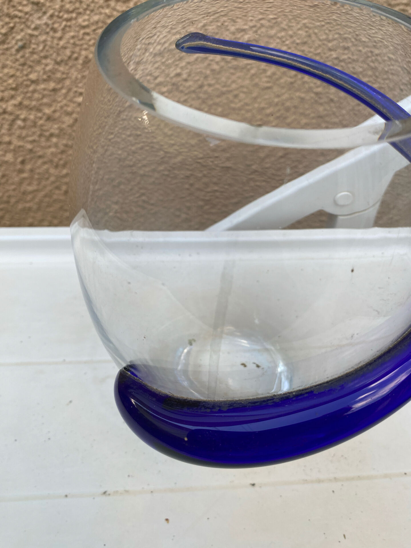 Contemporary vase in blown transparent glass & cobalt blue thread.