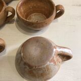 Set of 9 cups and under cups in sandstone