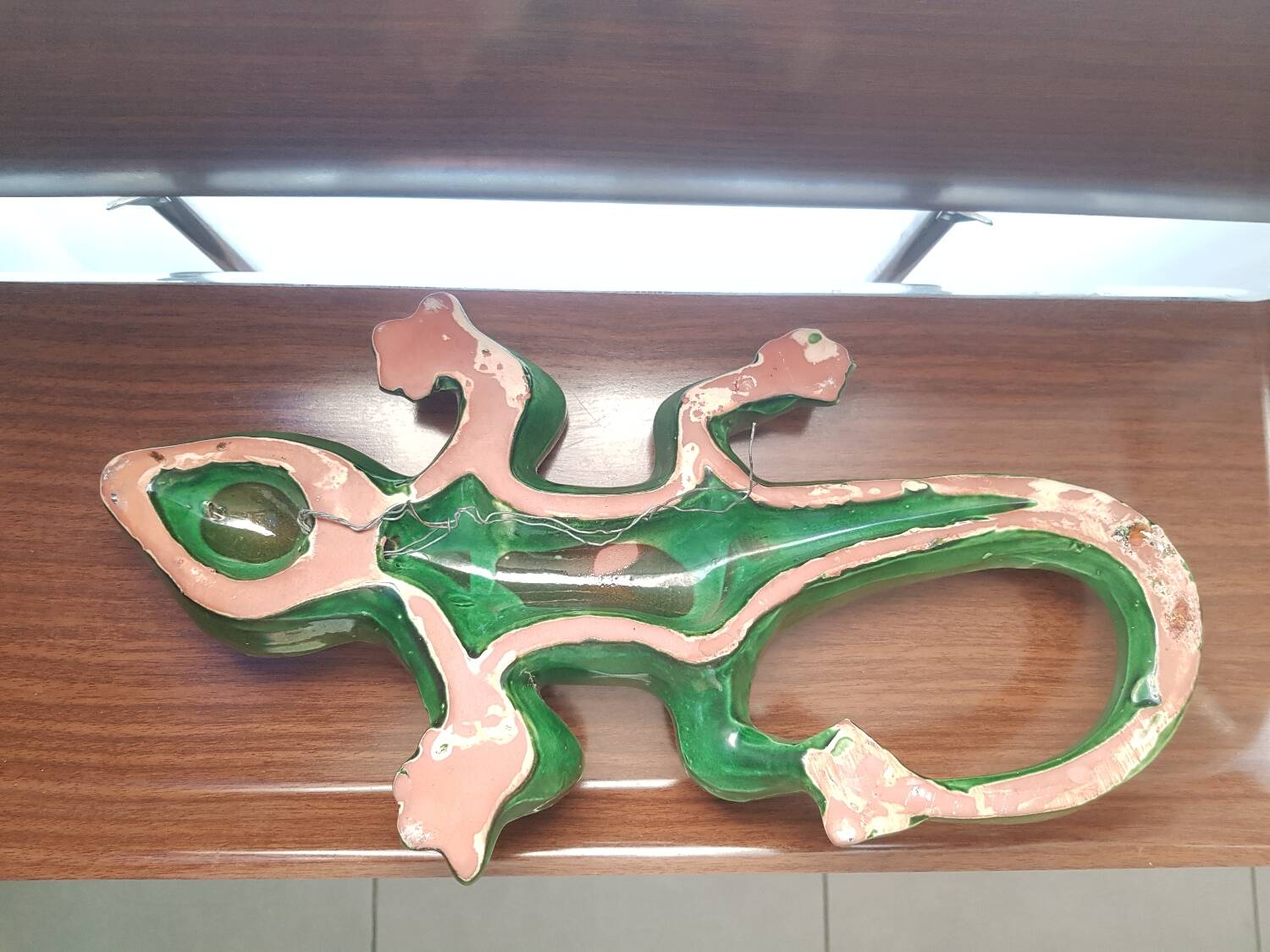Green ceramic lizard