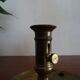 Pair of vintage brass pusher candle holders