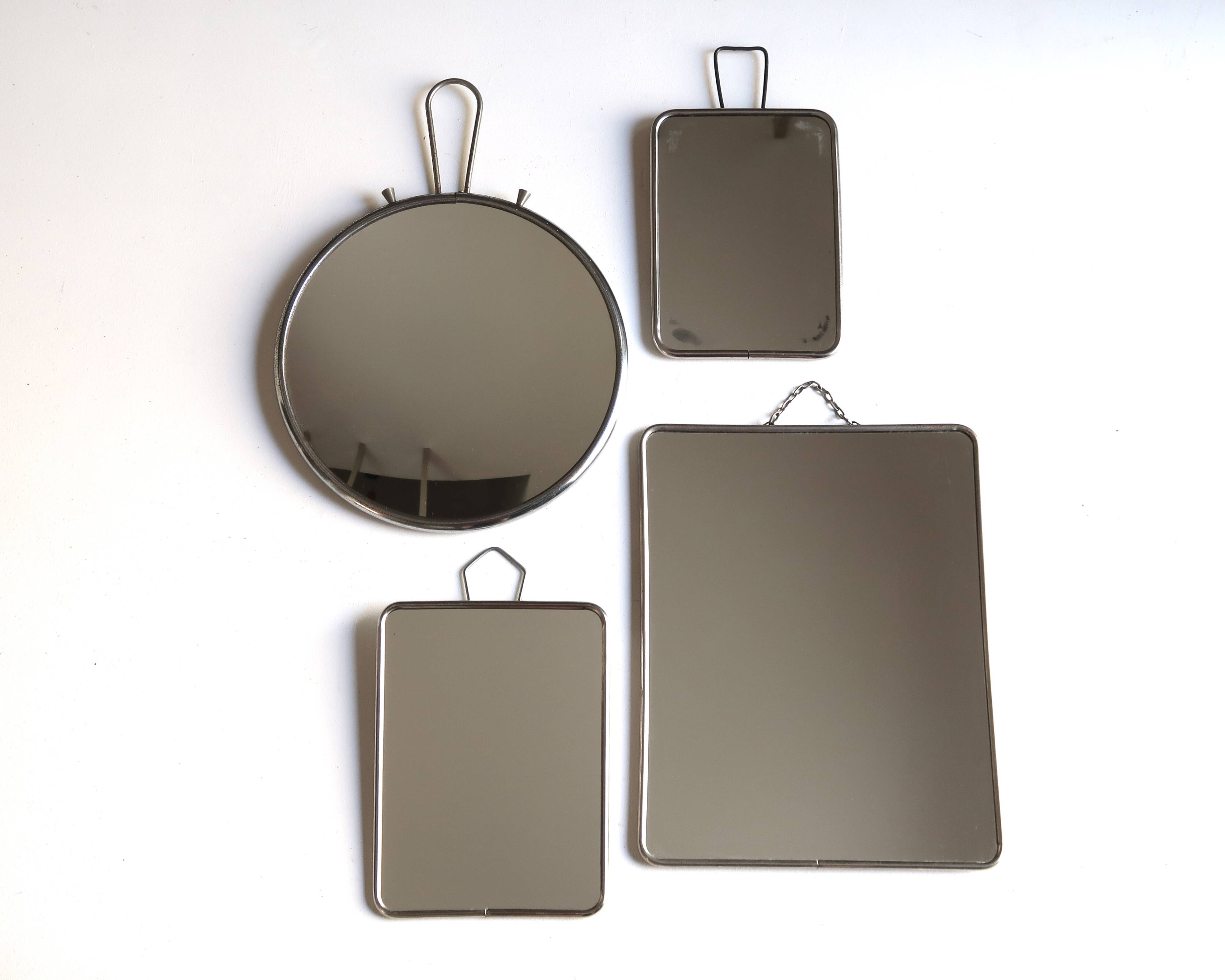 Set of four rectangular and round barber mirrors, 1950s.