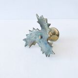 Candlestick in brass holly design