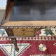 Louis XVI style desk from the late 19th century in walnut with a leather top.