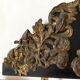 Pediment in blackened wood and 19th century embossed gilded metal foil